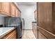 Laundry room with a washing machine, dryer, cabinets, and countertop space at 4328 N Pinnacle Ridge Cir, Mesa, AZ 85207