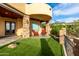 Charming outdoor seating area with a manicured lawn, perfect for enjoying the desert landscape at 4328 N Pinnacle Ridge Cir, Mesa, AZ 85207