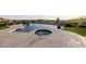 Resort-style pool and spa with desert views, surrounded by a spacious patio area at 4328 N Pinnacle Ridge Cir, Mesa, AZ 85207