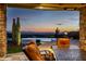 Outdoor pool area featuring seating, a fire pit, and mountain views at 4328 N Pinnacle Ridge Cir, Mesa, AZ 85207