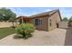 Expansive backyard featuring low-maintenance desert landscaping, providing a private and tranquil outdoor retreat at 4404 W Ellis St, Laveen, AZ 85339