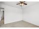 Bright bedroom with ceiling fan, and neutral carpet at 4404 W Ellis St, Laveen, AZ 85339