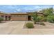Charming home featuring a two-car garage, desert landscaping, and a neutral color palette at 4404 W Ellis St, Laveen, AZ 85339