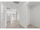 Bright hallway with tiled flooring leading to the living spaces at 4404 W Ellis St, Laveen, AZ 85339