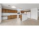 Kitchen featuring wood cabinets, a white refrigerator and appliances, and recessed lighting at 4404 W Ellis St, Laveen, AZ 85339