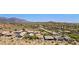 Gorgeous community featuring desert landscaping, beautiful homes, and scenic mountain views at 4562 S Alamos Way, Gold Canyon, AZ 85118