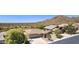 Desert home boasts lush trees, multi-car garage, and gorgeous desert mountain views at 4562 S Alamos Way, Gold Canyon, AZ 85118