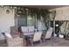 Serene patio with comfortable seating amidst lush climbing greenery at 4718 W Sanna St, Glendale, AZ 85302