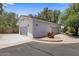 Detached three-car garage featuring an extra wide driveway at 4801 E Horseshoe Rd, Paradise Valley, AZ 85253