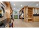 Spacious walk-in closet featuring custom shelving, drawers, and a vanity area, offering ample storage and organization at 4801 E Horseshoe Rd, Paradise Valley, AZ 85253