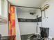 This bathroom features white subway tiles with a horizontal black accent stripe and a stylish shower at 520 S Macdonald --, Mesa, AZ 85210