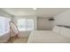 Bright bedroom with natural light, wood floors, and a closet for ample storage at 520 S Macdonald --, Mesa, AZ 85210