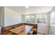 Charming breakfast nook with wood table, built-in seating, and lots of sunlight at 520 S Macdonald --, Mesa, AZ 85210