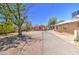 Cozy single-story home with a spacious yard and a private driveway leading to the property at 520 S Macdonald --, Mesa, AZ 85210