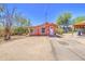 Charming single-story home with a well-maintained front yard and inviting entrance at 520 S Macdonald --, Mesa, AZ 85210
