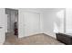 Neat bedroom featuring closet, neutral carpet, and white walls at 521 N Cambridge St, Gilbert, AZ 85233