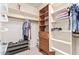 Walk-in closet with shelving and hanging storage at 521 N Cambridge St, Gilbert, AZ 85233