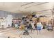 This spacious garage has ample storage space with cabinets and shelving for organization and storage solutions at 521 N Cambridge St, Gilbert, AZ 85233