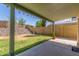 Covered patio with a view of the backyard and rock landscaping at 619 E Jensen St # 34, Mesa, AZ 85203