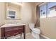 Bathroom featuring decorative mirror, vanity with marble countertop, and tile floors at 619 E Jensen St # 34, Mesa, AZ 85203