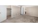 Bedroom featuring neutral walls, carpet flooring, closet, and ensuite bathroom at 619 E Jensen St # 34, Mesa, AZ 85203