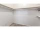Walk-in closet offers ample storage with shelving and hanging space at 619 E Jensen St # 34, Mesa, AZ 85203