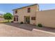 The exterior of a two story home, surrounded by decorative rock at 619 E Jensen St # 34, Mesa, AZ 85203