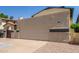 Charming two-story home with a spacious two-car garage and adjacent landscaping at 619 E Jensen St # 34, Mesa, AZ 85203
