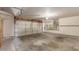 Spacious garage with storage and an automatic garage door at 619 E Jensen St # 34, Mesa, AZ 85203