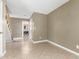 A bonus room located on the bottom floor, next to the stairs at 619 E Jensen St # 34, Mesa, AZ 85203