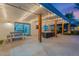 Spacious covered patio with lights, perfect for outdoor entertaining and relaxation at 6310 E Desert Cove Ave, Scottsdale, AZ 85254