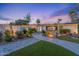 Charming single story home with manicured landscaping and inviting walkway at 6310 E Desert Cove Ave, Scottsdale, AZ 85254