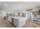 Bright kitchen featuring a large island, stainless steel appliances, and open design at 6310 E Desert Cove Ave, Scottsdale, AZ 85254