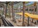 Aerial view of a community space featuring a pool, spa, and outdoor dining at 6565 E Thomas Rd # 1096, Scottsdale, AZ 85251
