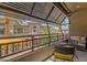 Charming balcony with comfortable seating, offering a view of the surrounding neighborhood at 6565 E Thomas Rd # 1096, Scottsdale, AZ 85251