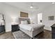 Calm bedroom with a decorative rug, ceiling fan, and a full bed at 6565 E Thomas Rd # 1096, Scottsdale, AZ 85251