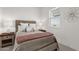 Cozy bedroom with decorative art and two bedside tables that add character and functionality at 6565 E Thomas Rd # 1096, Scottsdale, AZ 85251
