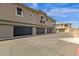 Exterior view of garages providing covered parking and additional storage space at 6565 E Thomas Rd # 1096, Scottsdale, AZ 85251