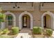 Inviting townhouse featuring charming architectural details and manicured landscaping at 6565 E Thomas Rd # 1096, Scottsdale, AZ 85251