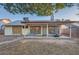 View of the backyard with a covered patio, providing shade and comfort at 7222 W Maryland Ave, Glendale, AZ 85303