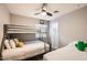Cozy bedroom featuring a bunk bed and a twin bed, perfect for a Gathering or guests at 7222 W Maryland Ave, Glendale, AZ 85303