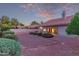 Spacious backyard with desert landscaping and covered patio at 7833 S Kenneth Pl, Tempe, AZ 85284