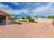 Backyard featuring low-maintenance landscaping, desert environment, and privacy walls at 7833 S Kenneth Pl, Tempe, AZ 85284