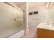Bathroom with vanity, tiled floor, bath and shower with glass door at 7833 S Kenneth Pl, Tempe, AZ 85284