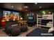Entertaining game room featuring a projector screen, foosball table, bunk beds, and playful decor for Gathering fun at 8214 E Northland Dr, Scottsdale, AZ 85251