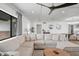 Comfortable living room features a neutral color palette, plush sectional sofa, and abundant natural light at 8214 E Northland Dr, Scottsdale, AZ 85251