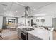 Bright, open-concept living room and kitchen with modern decor and stainless steel appliances at 8214 E Northland Dr, Scottsdale, AZ 85251