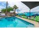 Beautiful pool area with lounge seating and a playful desert mural creating an inviting outdoor retreat at 8214 E Northland Dr, Scottsdale, AZ 85251