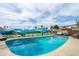 Relaxing swimming pool with a colorful mural, comfortable seating, and vibrant outdoor decor at 8214 E Northland Dr, Scottsdale, AZ 85251