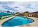 A stunning swimming pool with a charming mural, cozy patio furniture, and a refreshing outdoor space at 8214 E Northland Dr, Scottsdale, AZ 85251